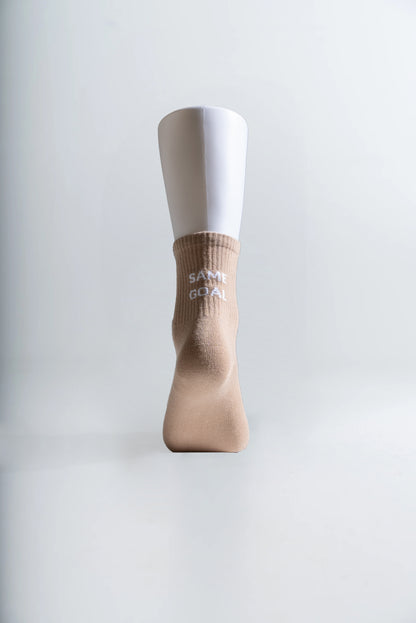 Sukat tekstillä beige